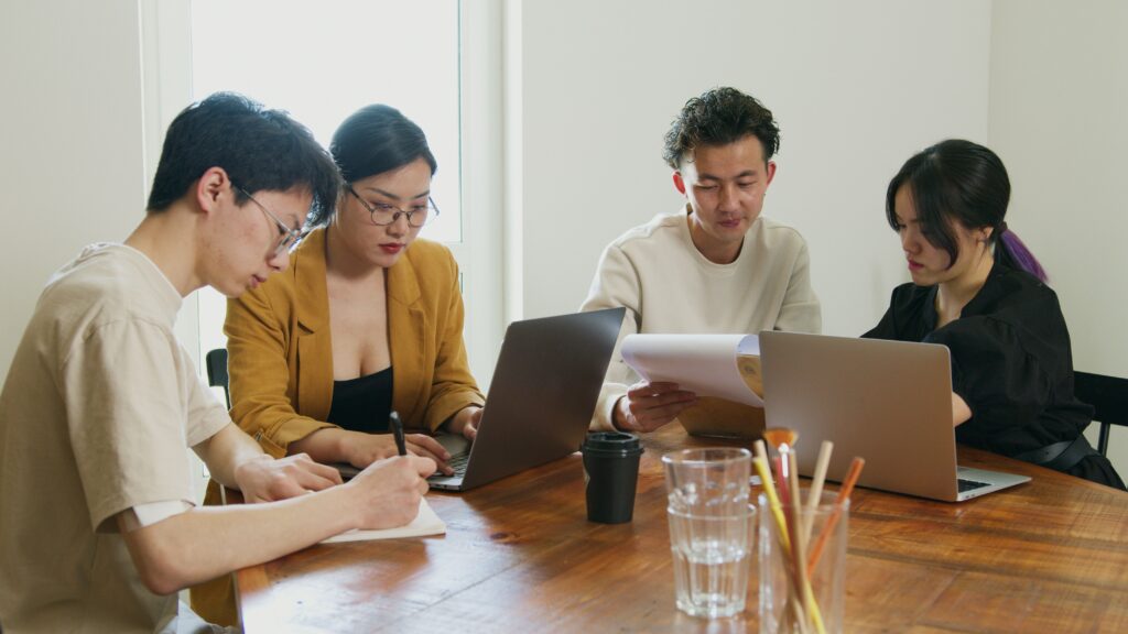 a group of people collaborating in a meeting